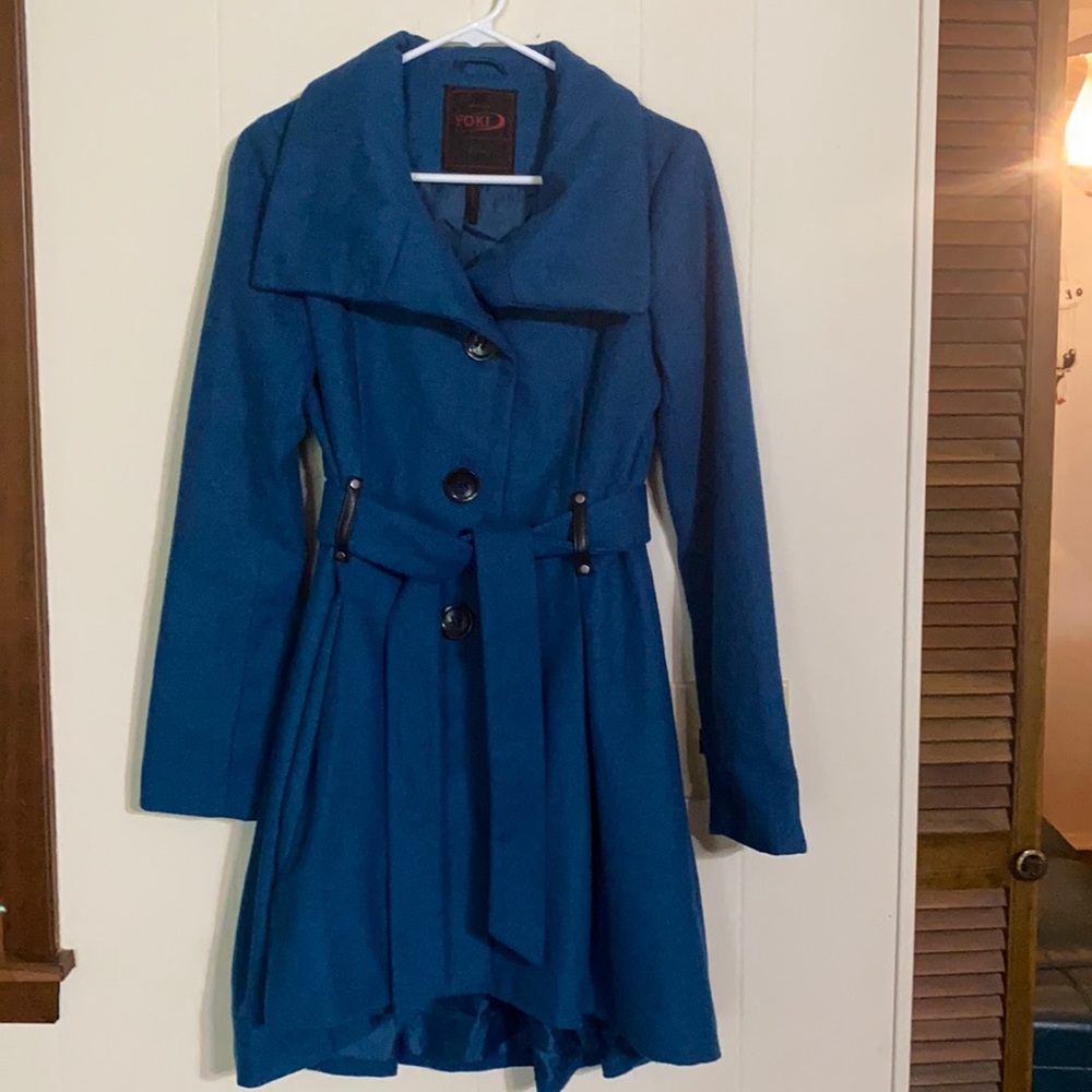 Teal winter coat.